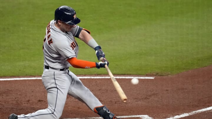 Oct 31, 2021; Atlanta, Georgia, USA; Houston Astros third baseman Alex Bregman (2) hits an RBI double against the Atlanta Braves during the second inning of game five of the 2021 World Series at Truist Park. Mandatory Credit: Dale Zanine-USA TODAY Sports