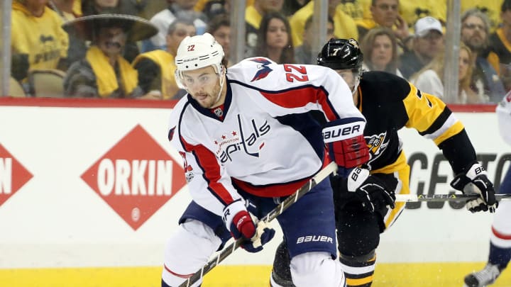 May 1, 2017; Pittsburgh, PA, USA; Washington Capitals defenseman Kevin Shattenkirk (22) moves the puck ahead of Pittsburgh Penguins center Matt Cullen (7) during the first period in game three of the second round of the 2017 Stanley Cup Playoffs at the PPG PAINTS Arena. Mandatory Credit: Charles LeClaire-USA TODAY Sports