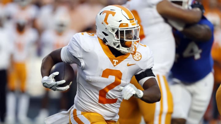Sep 25, 2021; Gainesville, Florida, USA; Tennessee Volunteers running back Jabari Small (2) runs with the ball against the Florida Gators during the first quarter at Ben Hill Griffin Stadium. Mandatory Credit: Kim Klement-USA TODAY Sports
