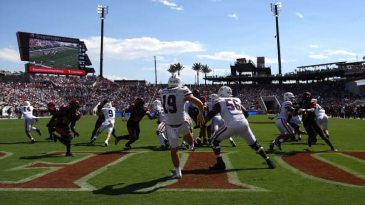 Sep 3, 2022; San Diego, California, USA; Arizona Wildcats punter Kyle Ostendorp (19) has his punt blocked resulting in a San Diego State Aztecs touchdown during the second half at Snapdragon Stadium. Mandatory Credit: Orlando Ramirez-USA TODAY Sports