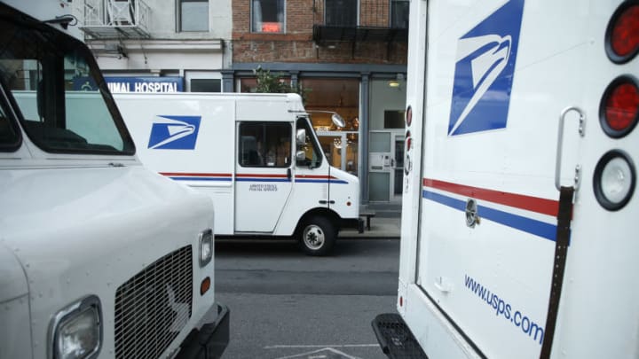 US Postal Service (USPS) trucks (Photo by John Lamparski/Getty Images)