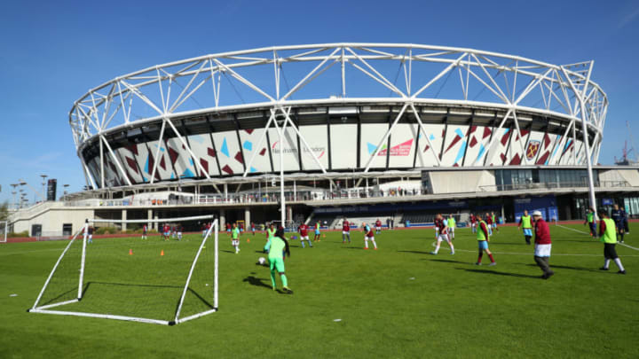LONDON, ENGLAND - SEPTEMBER 29: Fans play football outside the stadium prior to the Premier League match between West Ham United and Manchester United at London Stadium on September 29, 2018 in London, United Kingdom. (Photo by Warren Little/Getty Images)
