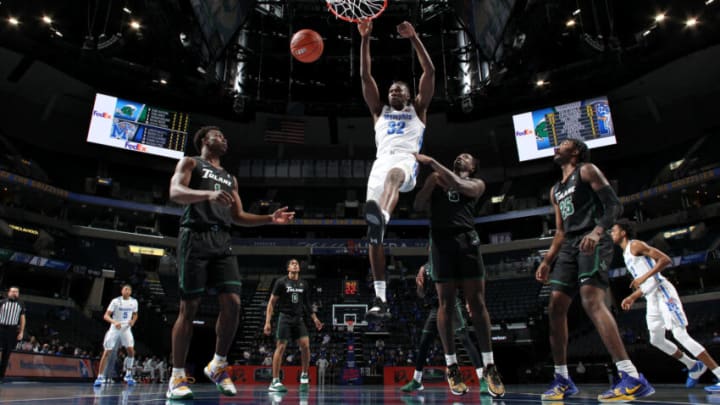 MEMPHIS, TN - FEBRUARY 24: Moussa Cisse #32 of the Memphis Tigers dunks the ball against the Tulane Green Wave during a game on February 24, 2021 at FedExForum in Memphis, Tennessee. Memphis defeated Tulane 61-46. (Photo by Joe Murphy/Getty Images)