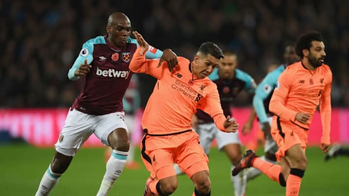 LONDON, ENGLAND - NOVEMBER 04: Roberto Firmino of Liverpool and Angelo Ogbonna of West Ham United in action during the Premier League match between West Ham United and Liverpool at London Stadium on November 4, 2017 in London, England. (Photo by Shaun Botterill/Getty Images)