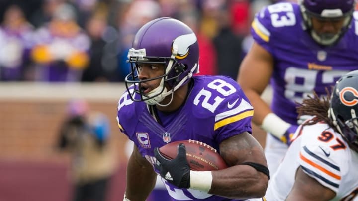 Dec 20, 2015; Minneapolis, MN, USA; Minnesota Vikings running back Adrian Peterson (28) runs in the second quarter against the Chicago Bears at TCF Bank Stadium. Mandatory Credit: Brad Rempel-USA TODAY Sports