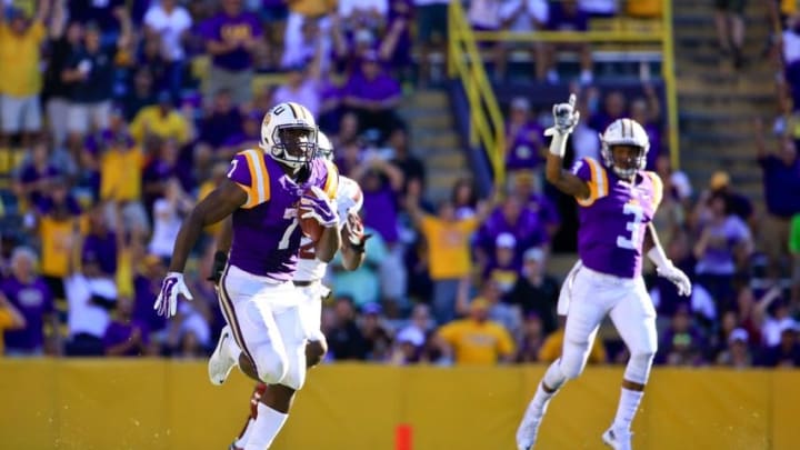 Oct 10, 2015; Baton Rouge, LA, USA; LSU Tigers running back Leonard Fournette (7) runs for an 87-yard touchdown during the third quarter of a game against the South Carolina Gamecocks at Tiger Stadium. Mandatory Credit: Derick E. Hingle-USA TODAY Sports