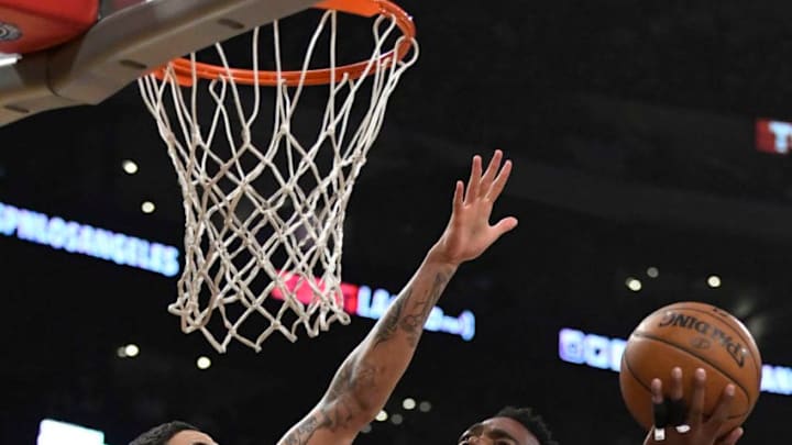 Denver Nuggets v Los Angeles LakersLOS ANGELES, CA - MARCH 13: Paul Millsap #4 of the Denver Nuggets attempts a lay up against Kyle Kuzma #0 of the Los Angeles Lakers on March 13, 2018 at STAPLES Center in Los Angeles, California. NOTE TO USER: User expressly acknowledges and agrees that, by downloading and or using this photograph, User is consenting to the terms and conditions of the Getty Images License Agreement. (Photo by Robert Laberge/Getty Images)Getty ID: 931668700