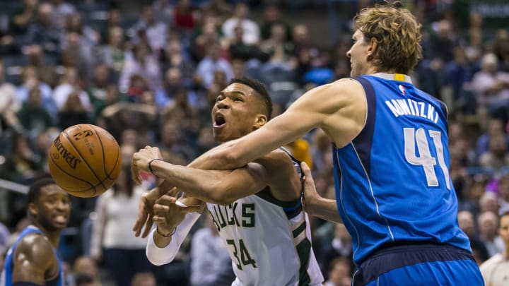 Jan 8, 2016; Milwaukee, WI, USA; Dallas Mavericks forward Dirk Nowitzki (41) defends against Milwaukee Bucks forward Giannis Antetokounmpo (34) during the third quarter at BMO Harris Bradley Center. Mandatory Credit: Jeff Hanisch-USA TODAY Sports