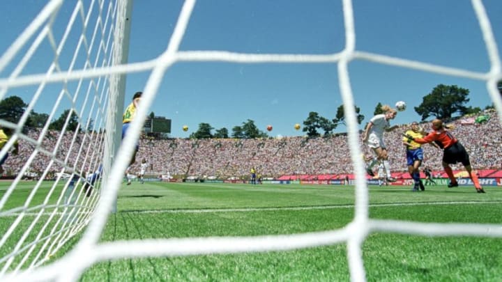 4 Jul 1999: Cindy Parlow #12 of Team USA heads the ball during the Womens World Cup game against Team Brazil at the Stanford Stadium in Palo Alto, California. Team USA defeated Team Brazil 2-0. Mandatory Credit: Jed Jacobsohn /Allsport