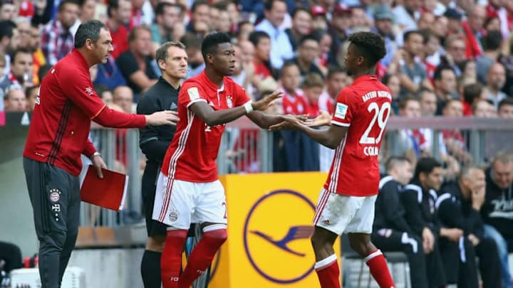 MUNICH, GERMANY - OCTOBER 01: David Alaba of Muenchen replaces Kingsley Coman during the Bundesliga match between Bayern Muenchen and 1. FC Koeln at Allianz Arena on October 1, 2016 in Munich, Germany. (Photo by Alex Grimm/Bongarts/Getty Images)