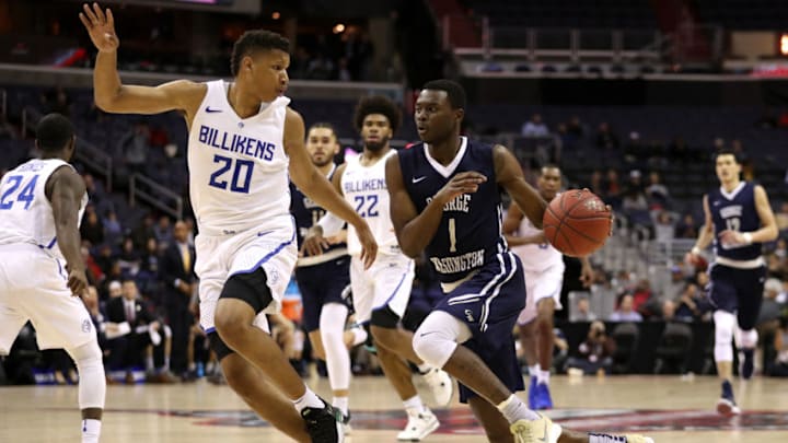 ncaa basketball: WASHINGTON, DC - MARCH 08: Terry Nolan Jr. #1 of the George Washington Colonials dribbles in front of Jalen Johnson #20 of the Saint Louis Billikens during the first half in the Second Round of the Atlantic 10 Basketball Tournament at Capital One Arena on March 8, 2018 in Washington, DC.(Photo by Patrick Smith/Getty Images)