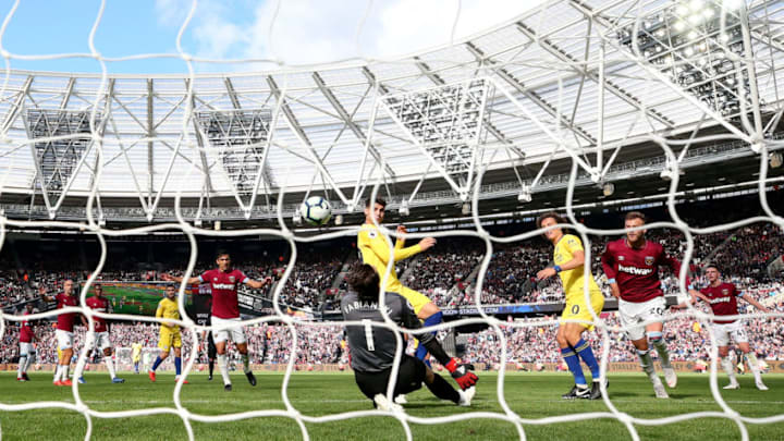 LONDON, ENGLAND - SEPTEMBER 23: Lukasz Fabianski of West Ham United saves a shot from Alvaro Morata of Chelsea during the Premier League match between West Ham United and Chelsea FC at London Stadium on September 23, 2018 in London, United Kingdom. (Photo by Dan Istitene/Getty Images)