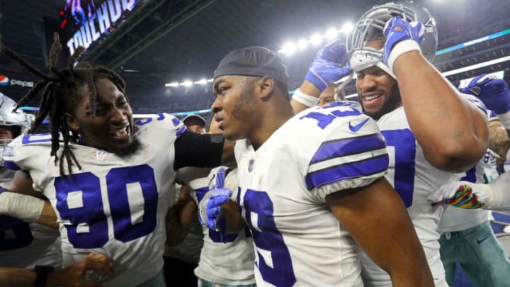 ARLINGTON, TEXAS - DECEMBER 09: Demarcus Lawrence #90 celebrates the game winning touchdown by Amari Cooper #19 of the Dallas Cowboys in overtime against the Philadelphia Eagles at AT&T Stadium on December 09, 2018 in Arlington, Texas. (Photo by Richard Rodriguez/Getty Images)