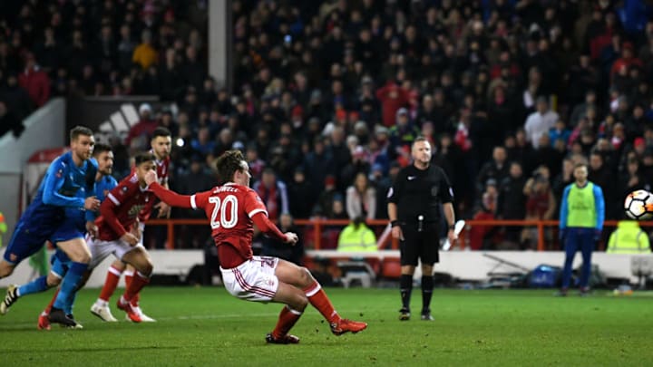 NOTTINGHAM, ENGLAND - JANUARY 07: Kieran Dowell of Nottingham Forest scores his team's fourth goal from the penalty spot during The Emirates FA Cup Third Round match between Nottingham Forest and Arsenal at City Ground on January 7, 2018 in Nottingham, England. (Photo by Laurence Griffiths/Getty Images)