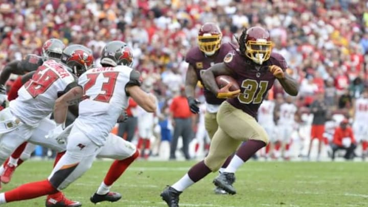 Oct 25, 2015; Landover, MD, USA; Washington Redskins running back Matt Jones (31) runs with the ball during the third quarter Tampa Bay Buccaneers at FedEx Field. Washington Redskins defeated Tampa Bay Buccaneers 31-30. Mandatory Credit: Tommy Gilligan-USA TODAY Sports