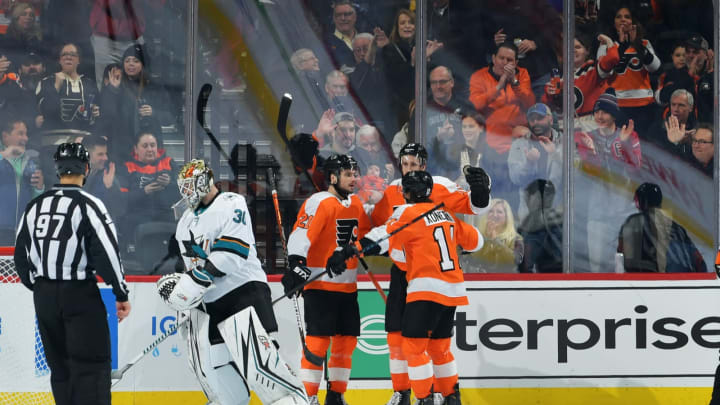PHILADELPHIA, PA – FEBRUARY 25: Scott Laughton #21, Kevin Hayes #13 and Travis Konecny #11 of the Philadelphia Flyers celebrate goal as Aaron Dell #30 of the San Jose Sharks skates away in the second period at Wells Fargo Center on February 25, 2020 in Philadelphia, Pennsylvania. (Photo by Drew Hallowell/Getty Images)