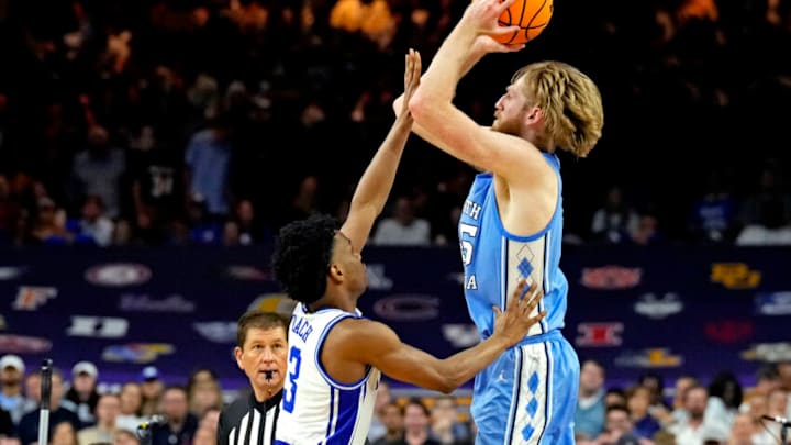 Apr 2, 2022; New Orleans, LA, USA; North Carolina Tar Heels forward Brady Manek (45) shoots the ball against Duke Blue Devils guard Jeremy Roach (3) in the 2022 NCAA men's basketball tournament Final Four semifinals at Caesars Superdome. Mandatory Credit: Robert Deutsch-USA TODAY Sports