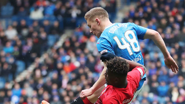 GLASGOW, SCOTLAND - MARCH 17:Aaron Tshibola of Kilmarnock vies with Greg Docherty of Rangers during the Ladbrokes Scottish Premiership match between Rangers and Kilmarnock at Ibrox Stadium on March 17, 2018 in Glasgow, Scotland. (Photo by Ian MacNicol/Getty Images)