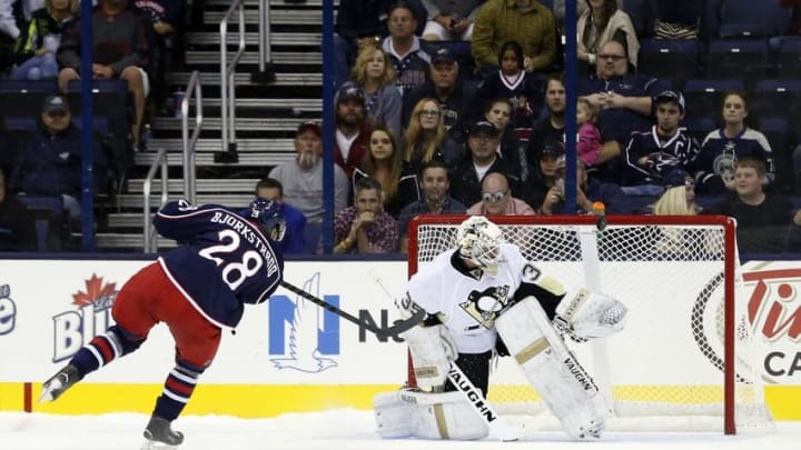 Sep 21, 2015; Columbus, OH, USA; Columbus Blue Jackets right wing Oliver Bjorkstrand (28) misses a shot on goal in the shootout against the Pittsburgh Penguins goalie Tristan Jarry (35) at Nationwide Arena. The Penguins won 1-0 in a shootout. Mandatory Credit: Aaron Doster-USA TODAY Sports