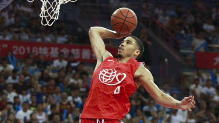DALIAN, CHINA - AUGUST 12: Jayson Tatum of American Professional Nike Rising Star Team shoots the ball against Chinese Men's Basketball Stars Team during 2018 Yao Foundation Charity Game at Dalian Sports Center on August 12, 2018 in Dalian, Liaoning Province of China. (Photo by VCG)