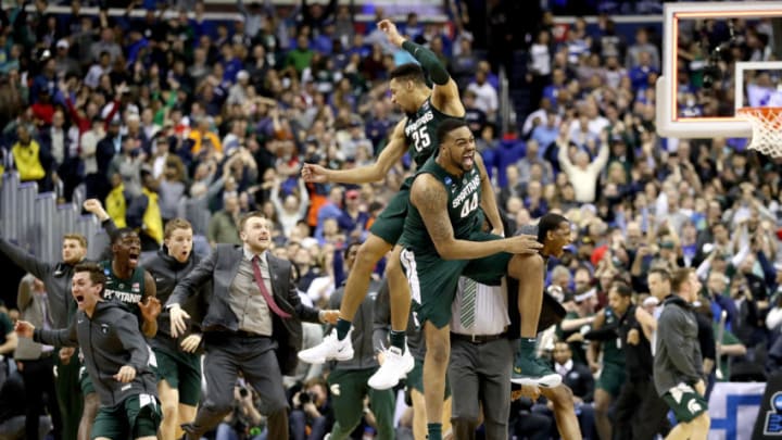 WASHINGTON, DC - MARCH 31: Nick Ward #44 and Kenny Goins #25 of the Michigan State Spartans celebrate their teams 68-67 win over the Duke Blue Devils in the East Regional game of the 2019 NCAA Men's Basketball Tournament at Capital One Arena on March 31, 2019 in Washington, DC. (Photo by Patrick Smith/Getty Images)