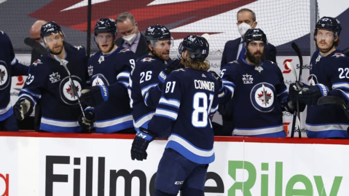 Apr 5, 2021; Winnipeg, Manitoba, CAN; Winnipeg Jets left wing Kyle Connor (81) celebrates his second period goal against the Ottawa Senators at Bell MTS Place. Mandatory Credit: James Carey Lauder-USA TODAY Sports