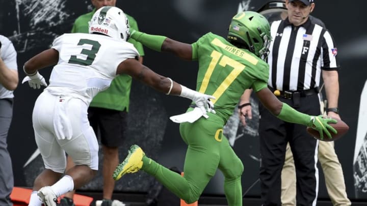EUGENE, OR - SEPTEMBER 08: Wide receiver Tabari Hines #17 of the Oregon Ducks scores a touchdown in front of safety Sam Inos #3 of the Portland State Vikings during the first quarter of the game at Autzen Stadium on September 8, 2018 in Eugene, Oregon. (Photo by Steve Dykes/Getty Images)