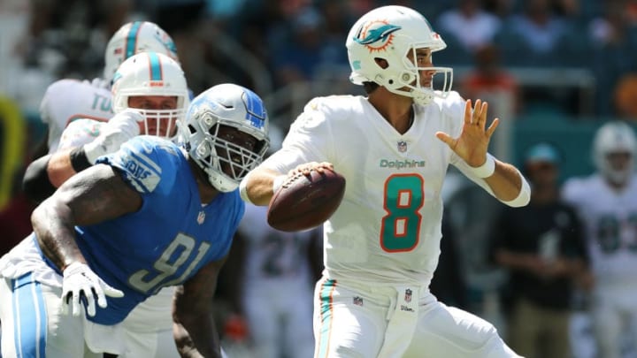 MIAMI, FL - OCTOBER 21: A'Shawn Robinson #91 of the Detroit Lions puts pressure on Brock Osweiler #8 of the Miami Dolphins during the first half at Hard Rock Stadium on October 21, 2018 in Miami, Florida. (Photo by Michael Reaves/Getty Images)
