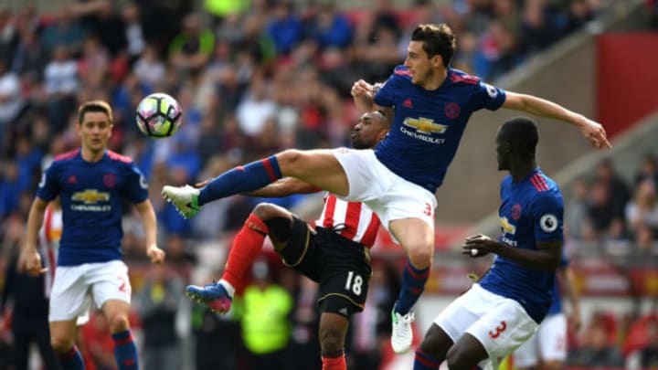SUNDERLAND, ENGLAND – APRIL 09: Matteo Darmian of Manchester United challenges for the ball with Jermain Defoe of Sunderland during the Premier League match between Sunderland and Manchester United at Stadium of Light on April 9, 2017 in Sunderland, England. (Photo by Shaun Botterill/Getty Images)