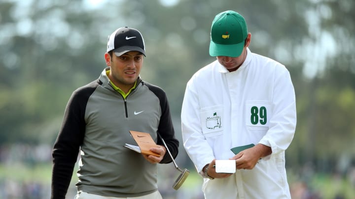 AUGUSTA, GA – APRIL 08: Francesco Molinari of Italy waits with his caddie Jason Hempleman during a practice round prior to the start of the 2014 Masters Tournament at Augusta National Golf Club on April 8, 2014 in Augusta, Georgia. (Photo by Andrew Redington/Getty Images)