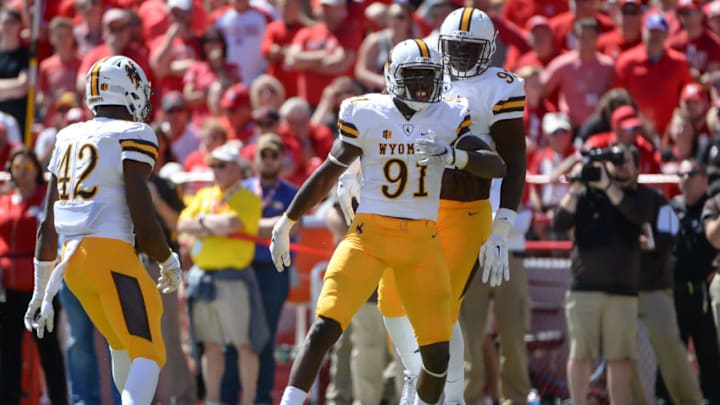 LINCOLN, NE - SEPTEMBER 10: Defensive end Carl Granderson #91 of the Wyoming Cowboys celebrates a stop against the Nebraska Cornhuskers at Memorial Stadium on September 10, 2016 in Lincoln, Nebraska. Nebraska defeated Wyoming 52-14. (Photo by Steven Branscombe/Getty Images)