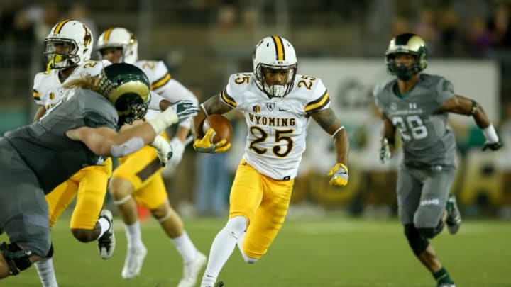 FORT COLLINS, CO - OCTOBER 1: Austin Conway #25 of the Wyoming Cowboys returns a punt against the Colorado State Rams at Sonny Lubick Field at Hughes Stadium on October 1, 2016 in Fort Collins, Colorado. (Photo by Justin Edmonds/Getty Images)