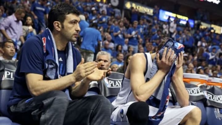 Apr 23, 2016; Dallas, TX, USA; Dallas Mavericks forward Dirk Nowitzki (right) and center Zaza Pachulia (left) react during the fourth quarter against the Oklahoma City Thunder in game four of the first round of the NBA Playoffs at American Airlines Center. Mandatory Credit: Kevin Jairaj-USA TODAY Sports