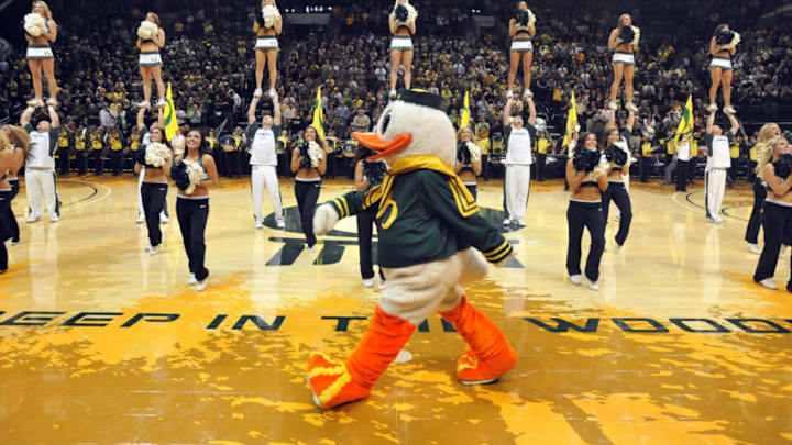 EUGENE, OR - JANUARY 13: 'Puddles', the Oregon Ducks mascot walks on the court during the pre-game ceremonies before the first game between the USC Trojans and the Oregon Ducks basketball teams at Matt Court on January 13, 2011 in Eugene, Oregon. The arena is named co-founder and Chairman of Nike, Inc., Phil Knight's son, Matthew, who died at the age of 34 in a scuba diving accident. (Photo by Steve Dykes/Getty Images)