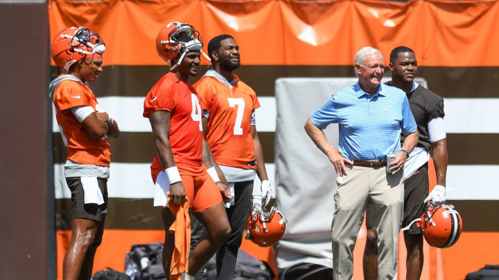 CLEVELAND, OH – JUNE 16: Managing and principal partner Jimmy Haslam of the Cleveland Browns (R) laughs with Deshaun Watson #4, Joshua Dobbs #15, Jacoby Brissett #7 and Amari Cooper #2 during the Cleveland Browns mandatory minicamp at FirstEnergy Stadium on June 16, 2022 in Cleveland, Ohio. (Photo by Nick Cammett/Getty Images)