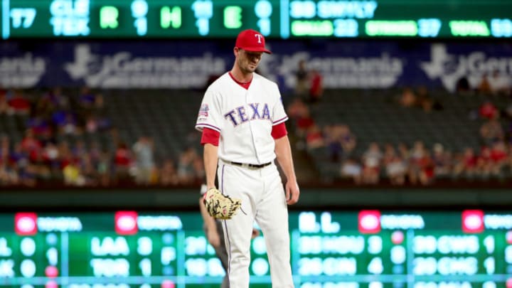 ARLINGTON, TEXAS - JUNE 18: Drew Smyly #33 of the Texas Rangers reacts after giving up a solo home run against the Cleveland Indians in the top of the seventh inning at Globe Life Park in Arlington on June 18, 2019 in Arlington, Texas. (Photo by Tom Pennington/Getty Images)