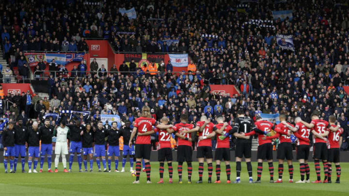SOUTHAMPTON, ENGLAND - FEBRUARY 09: Players, officials and fans take part in a minute of silence in tribute to Emiliano Sala prior to the Premier League match between Southampton FC and Cardiff City at St Mary's Stadium on February 9, 2019 in Southampton, United Kingdom. (Photo by Henry Browne/Getty Images)
