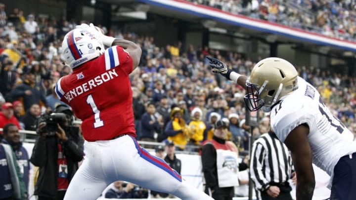 Dec 23, 2016; Fort Worth, TX, USA; Louisiana Tech Bulldogs wide receiver Carlos Henderson (1) catches a touchdown pass against Navy Midshipmen cornerback Tyris Wooten (17) in the second quarter at Amon G. Carter Stadium. Mandatory Credit: Tim Heitman-USA TODAY Sports