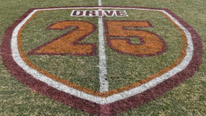 BLACKSBURG, VA - NOVEMBER 26: A detailed view of a field logo used to launch an upcoming athletic department fundraising campaign at Lane Stadium on November 26, 2016 in Blacksburg, Virginia. Each week a different special teams player wears #25 to honor former head coach Frank Beamer. Virginia Tech defeated Virginia 52-10. (Photo by Michael Shroyer/Getty Images) *** Local Caption ***