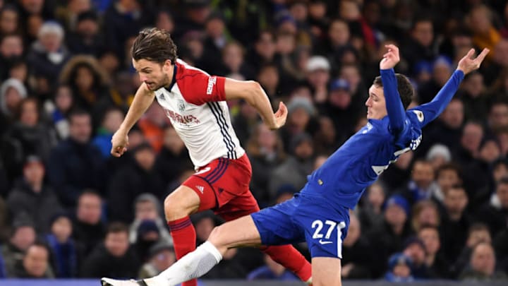 LONDON, ENGLAND - FEBRUARY 12: Andreas Christensen of Chelsea tackles Jay Rodriguez of West Bromwich Albion during the Premier League match between Chelsea and West Bromwich Albion at Stamford Bridge on February 12, 2018 in London, England. (Photo by Mike Hewitt/Getty Images)