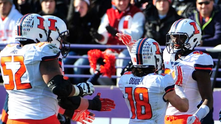 EVANSTON, IL - NOVEMBER 29: Malik Turner #86 of the Illinois Fighting Illini celebrates his touchdown with Mike Dudek #18 and Alex Hill #52 during the first half against the Northwestern Wildcats November 29, 2014 at Ryan Field in Evanston, Illinois. (Photo by David Banks/Getty Images)