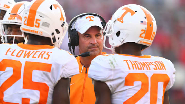 ATHENS, GA - SEPTEMBER 29: Head Coach Jeremy Pruitt of the Tennessee Volunteers discusses a play with Bryce Thompson #20 during the game against the Georgia Bulldogs on September 29, 2018 in Athens, Georgia. (Photo by Scott Cunningham/Getty Images)