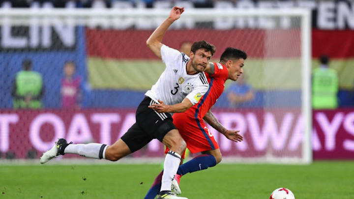 SAINT PETERSBURG, RUSSIA - JULY 02: Charles Aranguiz of Chile and Jonas Hector of Germany compete for the ball during the FIFA Confederations Cup Russia 2017 Final between Chile and Germany at Saint Petersburg Stadium on July 2, 2017 in Saint Petersburg, Russia. (Photo by Buda Mendes/Getty Images)