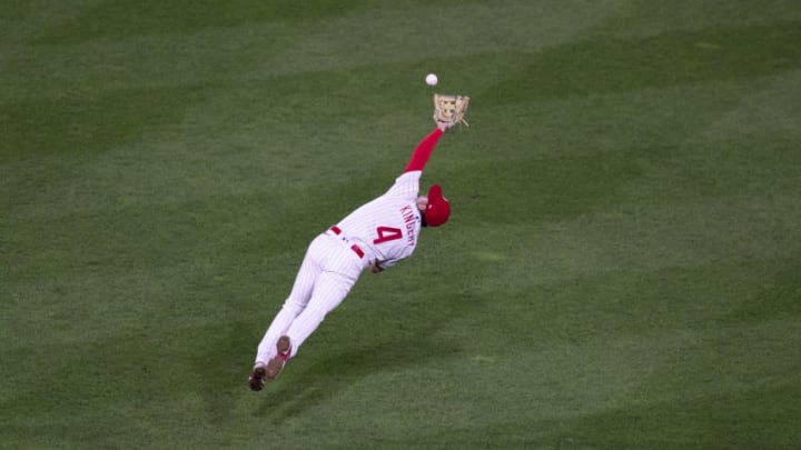 PHILADELPHIA, PA - SEPTEMBER 15: Scott Kingery #4 of the Philadelphia Phillies dives and cannot make the catch on a ball hit by J.D. Davis #28 of the New York Mets (not pictured) in the top of the ninth inning at Citizens Bank Park on September 15, 2020 in Philadelphia, Pennsylvania. The Phillies defeated the Mets 4-1. (Photo by Mitchell Leff/Getty Images)