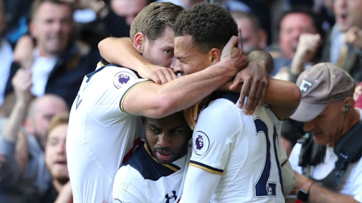 LONDON, ENGLAND - OCTOBER 02: Tottenham Hotspur's Dele Alli is congratulated after by Danny Rose and Jan Vertonghen after scoring his sides second goal during the Premier League match between Tottenham Hotspur and Manchester City at White Hart Lane on October 2, 2016 in London, England. (Photo by Rob Newell - CameraSport/CameraSport via Getty Images)