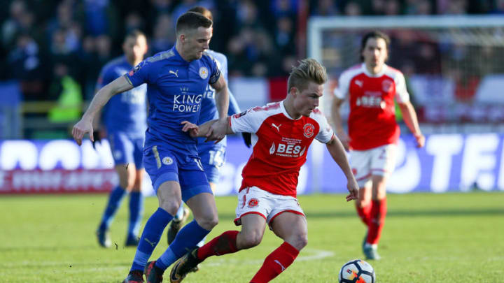 FLEETWOOD, ENGLAND - JANUARY 06: Kyle Dempsey of Fleetwood Town holds off Andy King of Leicester City during The Emirates FA Cup third round match between Fleetwood Town and Leicester City at Highbury Stadium on January 6, 2018 in Fleetwood, England. (Photo by Jan Kruger/Getty Images)