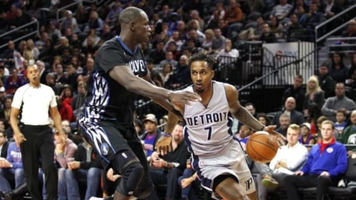 Dec 31, 2015; Auburn Hills, MI, USA; Detroit Pistons guard Brandon Jennings (7) gets defended by Minnesota Timberwolves center Gorgui Dieng (5) during the third quarter at The Palace of Auburn Hills. Pistons win 115-90. Mandatory Credit: Raj Mehta-USA TODAY Sports