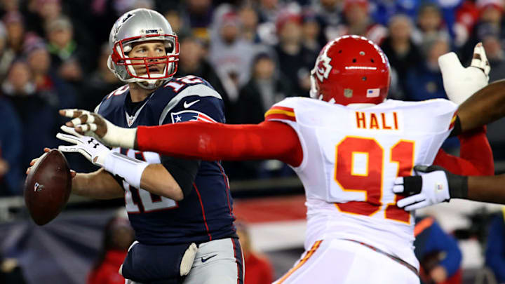 FOXBOROUGH, MA - JANUARY 16: Patriots quarterback Tom Brady under pressure from the Chiefs' Tamba Hali during second quarter action. The New England Patriots hosted the Kansas City Chiefs in an AFC divisional playoff game at Gillette Stadium in Foxborough, Mass., Saturday, Jan. 16, 2016. (Photo by Matthew J. Lee/The Boston Globe via Getty Images)