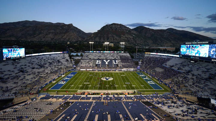 The Cincinnati Bearcats and the Brigham Young Cougars warm up prior to a college football game between the Brigham Young Cougars and the Cincinnati Bearcats, Friday, Sept. 29, 2023, at LaVell Edwards Stadium in Provo, Utah.