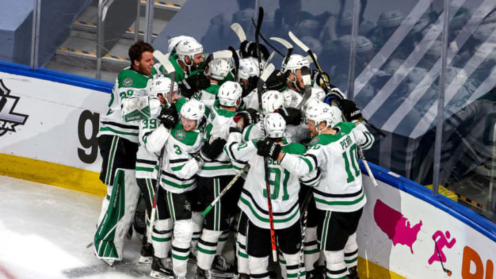 EDMONTON, ALBERTA - SEPTEMBER 04: Joel Kiviranta #25 of the Dallas Stars is congratulated by his teammates after scoring the game-winning goal against the Colorado Avalanche during the first overtime period to win Game Seven of the Western Conference Second Round during the 2020 NHL Stanley Cup Playoffs at Rogers Place on September 04, 2020 in Edmonton, Alberta, Canada. (Photo by Bruce Bennett/Getty Images)